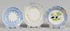 Three blue spatter toddy plates with fort, star, and wreath decoration