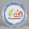 Blue spatter plate with schoolhouse decoration, 8 1/2'' dia.