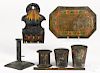 Seven pieces of toleware, to include a hanging match safe, a candlestick, a sander, etc.