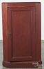Painted pine corner cupboard base, 19th c., retaining an old red surface, 53'' h., 31'' w.
