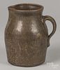 Southern alkaline glaze stoneware pitcher, 19th c., 9'' h.