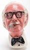 Dai Vernon Hanging Bust. Niagara Falls: Rob Allen, 1984. Vernon in bowtie with cigar, peg-hole on reverse for hanging. Signed, dated, and numbered by 