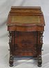 Antique Carved and Leather Top Davenport Desk.