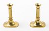 * A Pair of Brass Candlesticks Height 5 1/2 inches.