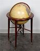 A Kittinger Mahogany and Brass Globe. Diameter 16 inches.