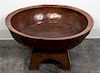 A Primitive Wash Basin. Height 14 1/2 x width 27 3/4 inches.