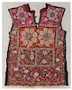 * A Pakistani Mica Decorated and Embroidered Silk Panel of a Wedding Blouse, Guj Length of textile 27 1/2 inches.
