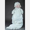A German 22in. Bisque Bye-Lo Baby Doll, 19th/20th Century,