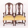 Pair of Italian Rococo style walnut open armchairs