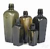 Five graduated olive glass bottles, 19th/20th c., 3 7/8'' - 7'' h.