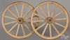Pair of wood and iron wagon wheels, early 20th c., 24 1/2'' dia.