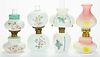 ASSORTED PATTERN DECORATED OPAQUE GLASS MINIATURE LAMPS, LOT OF FOUR,
