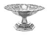 * An Indian Silver Bowl, Early 20th Century, with shaped flaring rim and densely chased with maple leaves and scrolling vines ag