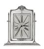 An American Silver Clock, Reed & Barton, Taunton, MA, the rectangular frame with arched top chased with a female medallion and d