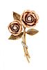 * A Retro Tricolor Gold and Diamond Flower Brooch, 11.30 dwts.