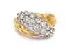 An 18 Karat Bicolor Gold and Diamond Ring, 8.10 dwts.