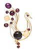 * A Yellow Gold, Star Ruby, Moonstone and Black Star Sapphire Brooch, 133.80 dwts.