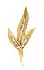 * An 18 Karat Yellow Gold and Diamond Leaf Brooch, Gübelin, 8.60 dwts.