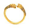 * A High Karat Yellow Gold and Polychrome Enamel Bypass Bracelet/Armband, 73.70 dwts.