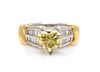 * A Platinum, 18 Karat Yellow Gold, Colored Diamond and Diamond Ring, 6.30 dwts.