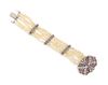 * A White Gold, Ruby, Diamond and Seed Pearl Multistrand Bracelet, 13.60 dwts.