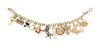 A 14 Karat Yellow Gold and Charm Bracelet with 13 Attached Charms, 19.80 dwts.