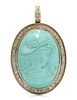 A 14 Karat Yellow Gold, Turquoise Cameo and Diamond Pendant/Brooch, 15.50 dwts.