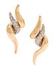 * A Pair of 18 Karat Bicolor Gold and Diamond Earclips, 7.10 dwts.