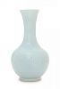 A Chinese Clair-de-Lune Glazed Porcelain Vase Height 9 inches. 天藍釉暗花撇口瓶，19世紀末，高9英吋