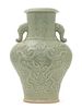 A Longquan Celadon Glazed Porcelain Vase Height 11 inches. 龍泉青釉龍紋象耳瓶，高11英吋