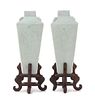 * A Pair of Celadon Glazed Porcelain Vases Height of each 6 1/4 inches. 淡青釉暗刻花卉紋四方瓶一對，高6.25英吋