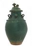 * A Green Glazed Earthenware Covered Jar Height 18 1/2 inches. 綠釉陶蓋罐，明，高18.5英吋