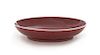 A Copper Red Glazed Porcelain Dish Diameter 6 1/2 inches. 紅釉盘，清乾隆，直徑6.5英吋