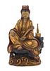 A Gilt Wood Figure of a Seated Guanyin Height 10 3/4 inches. 金彩木雕观音坐像，高10.75英吋