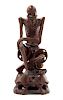A Carved Rosewood Figure of an Immortal Height 10 1/2 inches. 硬木雕人物坐像，高10.5英吋