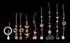 A Collection of Nine Jade Toggle Lanyards Length of longest 9 1/4 inches. 寶石掛件九件，最大长9.25英吋