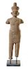 * A Khmer Sandstone Figure of a Male Deity Height of figure 58 3/4 inches.
