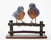 Two Blue Birds on a Fence