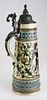 ca 1900 German beer stein with hand painted couple, 3 ﾽ liter, the letter G or monogram CT, or GT at base of handle, #'d 585 on base, ht 17.5ﾔ, un