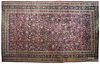 Semi-antique Persian carpet (reduced but strips present), 20' x 13'.