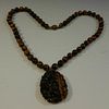 LARGE CHINESE CARVED TIGER'S EYE NECKLACE