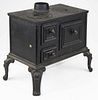 mid 19th c miniature cast iron stove, not a toy, 11” x 7” x 11”