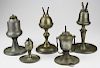 5 pcs of early 19th c lighting including whale oil & camphene, one with trunion frame, & small sparking whale oil lamp signed