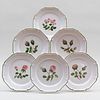 Set of Nine French Faience Plates Decorated with Flowers