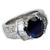 GAL Certified 2.70 Carat Oval Cut Sapphire, 2.0 Carat Round Brilliant and Baguette Cut Diamonds and 18 Karat White Gold Ring.
