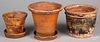 Three Pennsylvania redware flower pots, 19th c., t