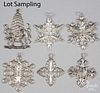 Thirty-two sterling silver Christmas ornaments