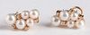 Pair of 14K gold, diamond, and pearl earrings