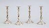 SET OF FOUR LOUIS XV STYLE SILVER-PLATED CANDLESTICKS