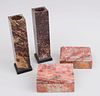 PAIR OF CEYLONESE MARBLE TEA LIGHT PILLAR HOLDERS AND TWO SIMILAR FLEUR DE PECHE MARBLE BOXES AND COVERS